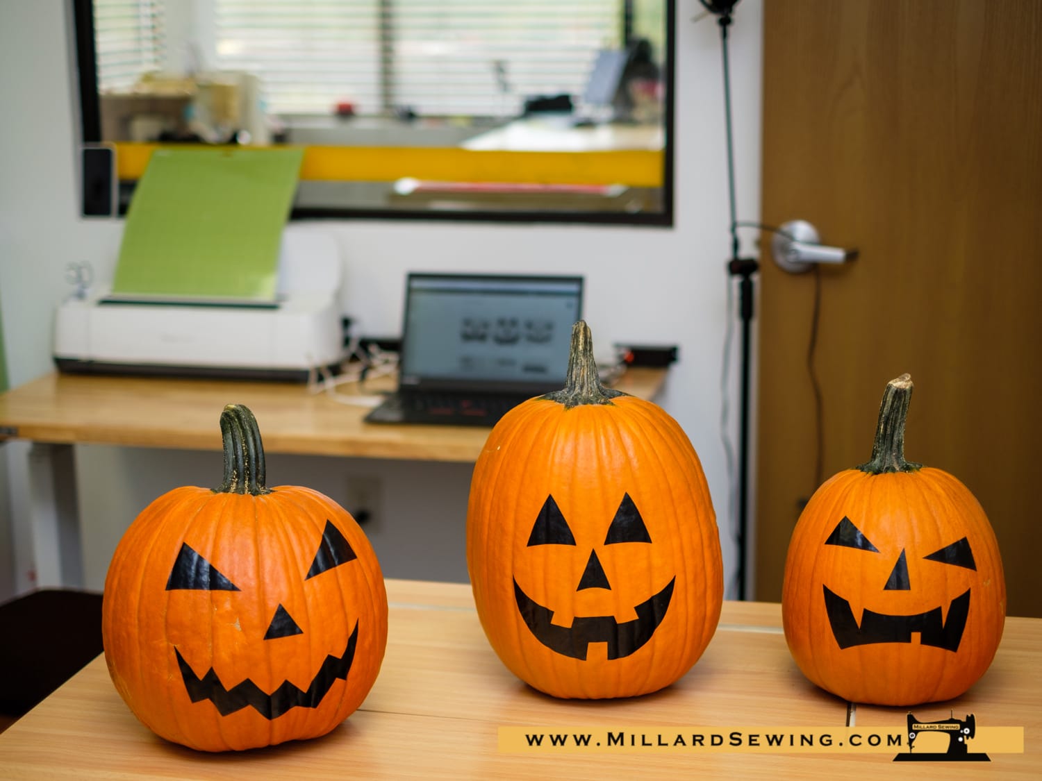 Some Quick Vinyl Work on the Cricut is all it took to transform our Pumpkins to a team of Jack-O-Lanterns