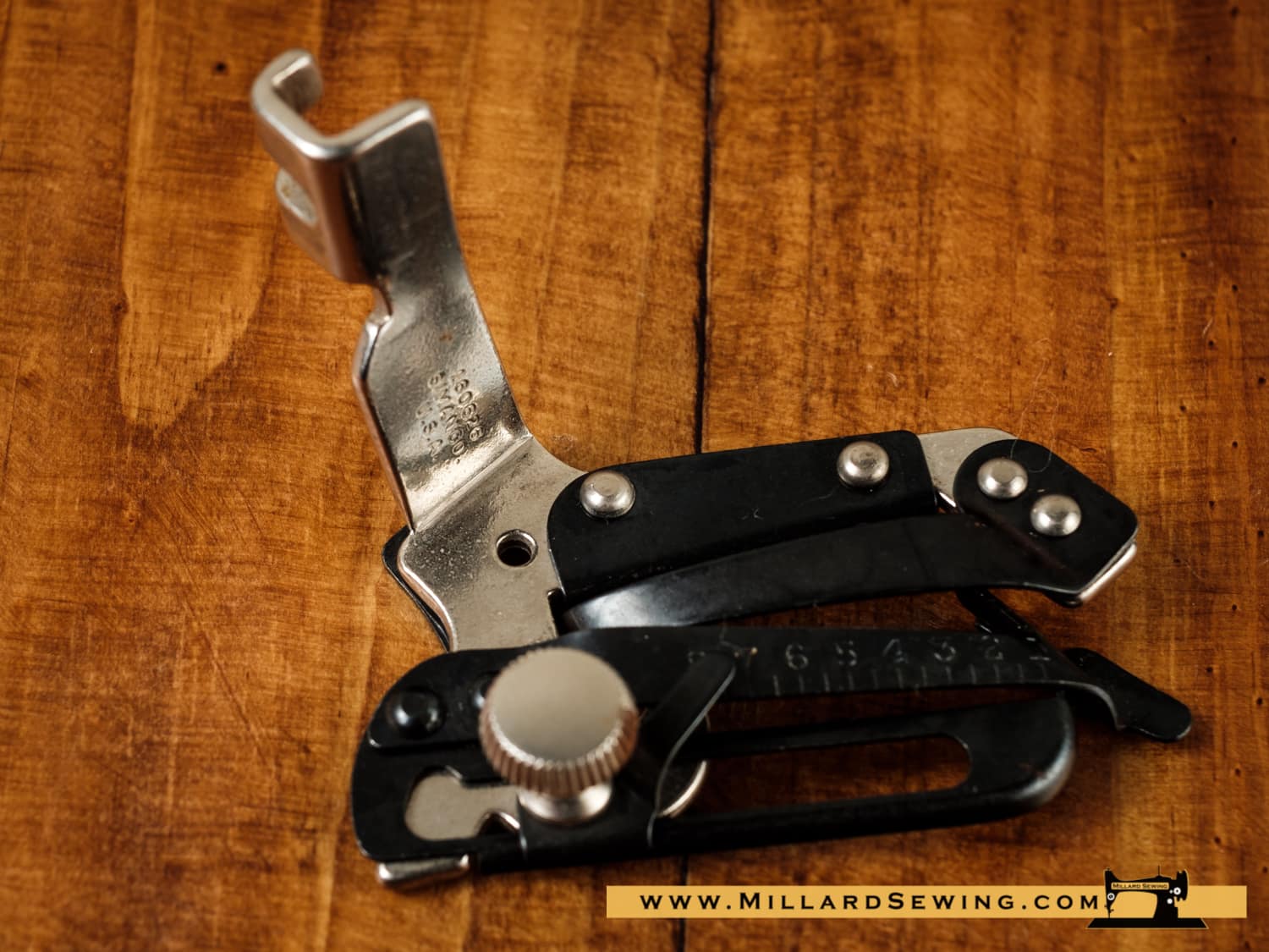 Hemmer Foot, Adjustable (Genuine) for Singer Slant Needle Sewing Machines