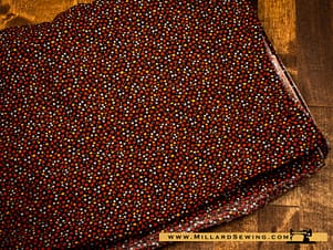 Remnant (Cotton) Black Fabric with Red & White Stars Fabric (2yds)