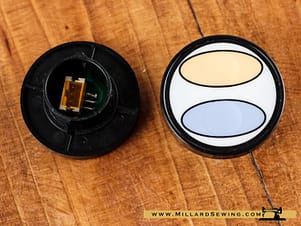 Button, Left Side (Blue/Yellow) for Long Arm Sewing Machines