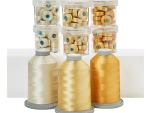 Top to Bobbin a Glide Thread Collection with L Class Bobbins