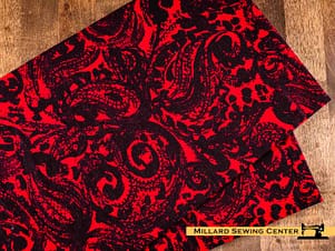 Remnant (Cotton) Black & Red with Paisley Print Fabric (34")