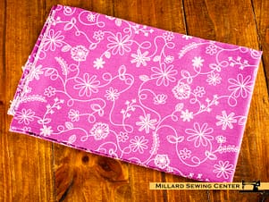 Cotton Fabric, 44″/45″ Wide Kimberbell Basics in Violet Red Swirl Floral by Maywood Studio