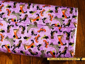 Woven Cotton Fabric, 43"/44" Wide in Ghoul Friends Boots Toss Purple Design by Riley Blake Designs