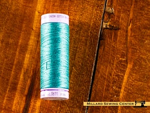 Silk Finish 50wt Mercerized Cotton Sewing Thread in 0611 Blue Green Opal by Mettler