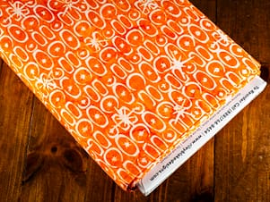 Cotton Fabric, 43"/44" Wide Batiks in Starburst Groove Tangerine by Riley Blake