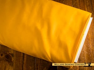 Cotton Fabric, 43"/44" Wide Kimberbell Basic Solids in Sunlit Saffron by Maywood Studio