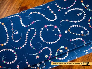 Cotton Fabric, 44" Friendship Bracelet Club in Friendship Bracelet Navy by Camelot Fabrics