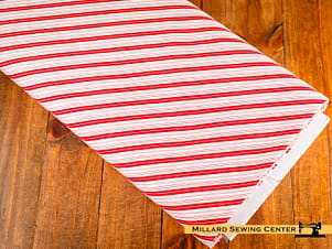 Cotton Fabric, 43"/44" Wide Claus & Co. in Candy Cane Stripes Red by Riley Blake