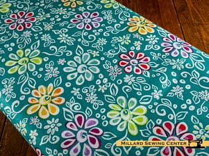Cotton Fabric, 43"/44" Wide Chasing Rainbows in Main Teal by Riley Blake
