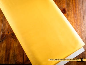 Cotton Fabric, 43"/44" Wide Kimberbell Basic Solids in Mustard Seed by Maywood Studio