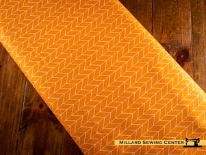 Cotton Fabric, 44″/45″ Wide Kimberbell Basics in Orange Chevron by Maywood Studio